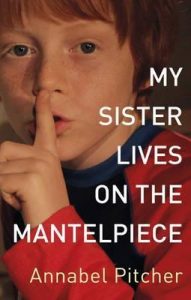Book cover
Text: My sister lives on the Mantelpiece
Annabel Pitcher
Image: Photograph of the face of a young child with a finger on her lips.