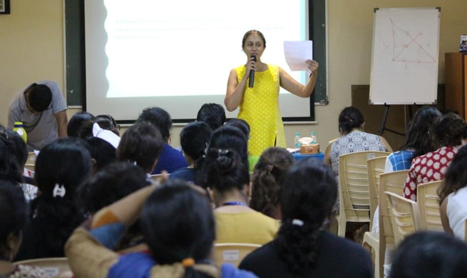 Varsha Seshan facing a group of teachers