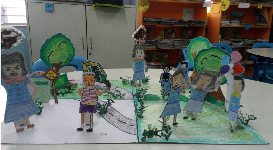 A pop up display of children based on the story A Cloud of Trash