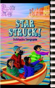 Book cover
Text: Star Struck!
Subhadra Sengupta
A Foxy 4 Adventure
Image: Four children in a boat looking at something one girl is pointing at