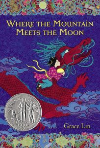 Book cover
Text: Where the Mountain Meets the Moon
Grace Lin
Within a silver medallion, the text: Newbery Honor Book
Image: A girl holding a pale yellow ball rides a red dragon in the clouds.