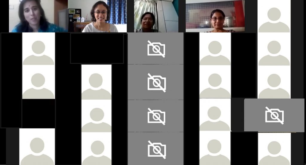 Zoom screenshot with four faces visible