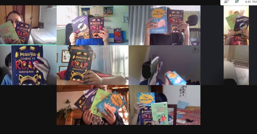 Screenshot of children covering their faces with their favourite books from the reading programme