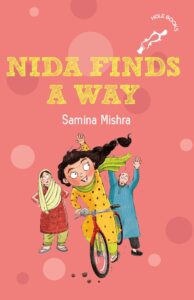 Book cover
Text: Nida Finds a Way
Samina Mishra
HOLE BOOKS
Image: 
Illustration of a girl waving as she cycles away from a worried couple
