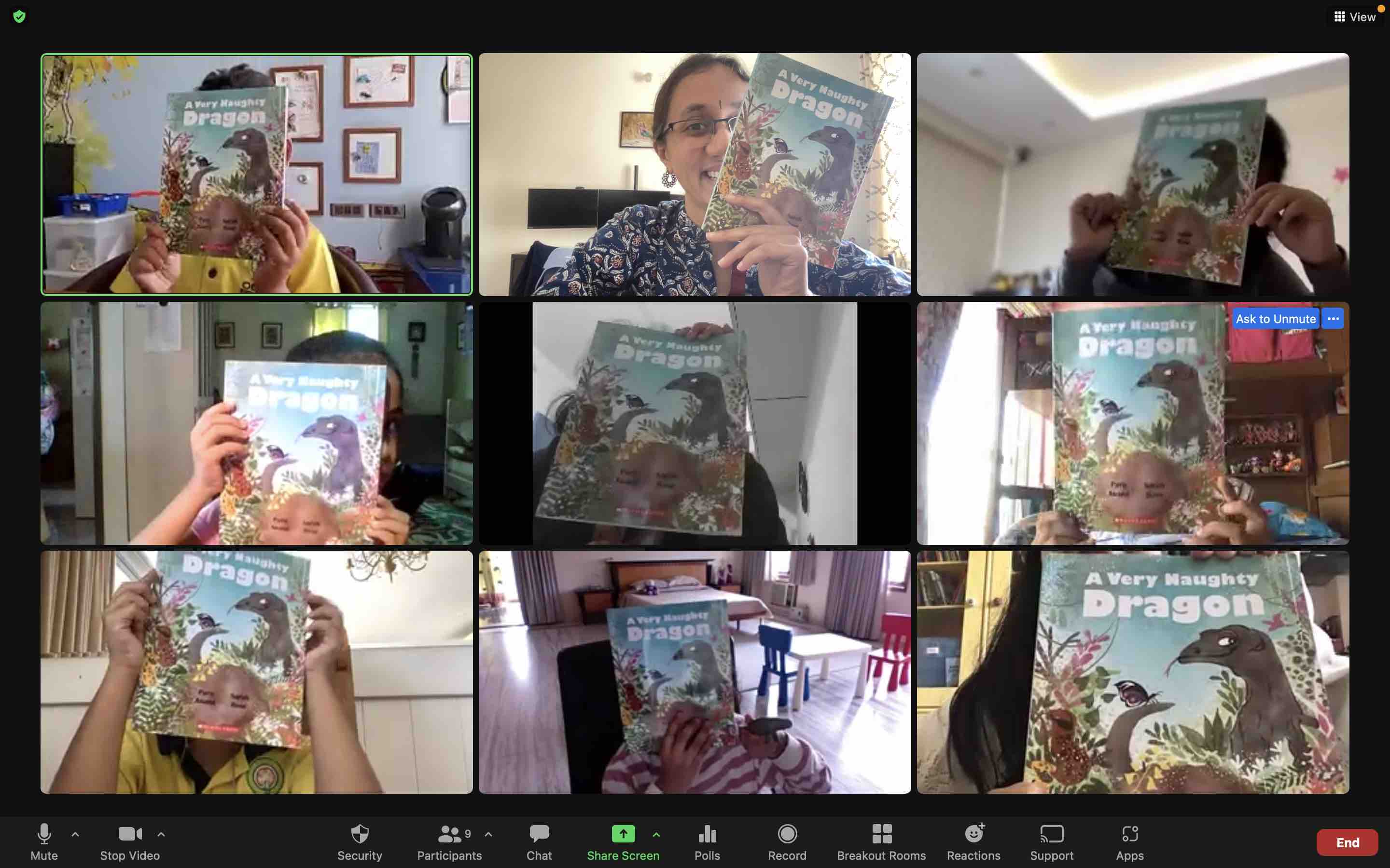 Screenshot of nine people holding up their copies of the book A Very Naughty Dragon, faces hidden.