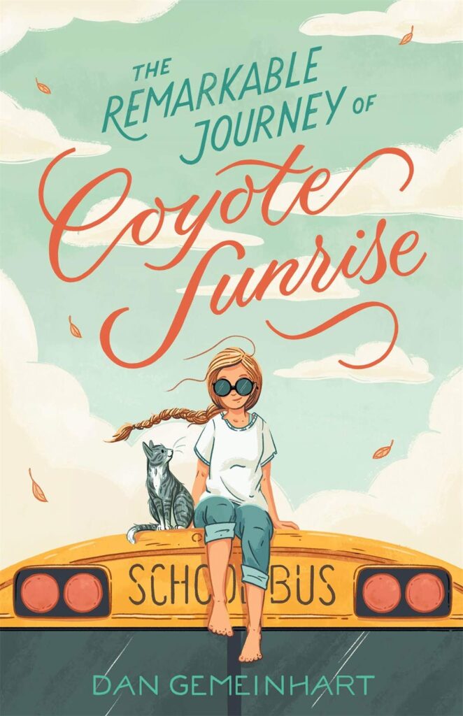 Book cover
Text - The Remarkable Journey of Coyote Sunrise
Dan Gameinhart
Image - A girl with long hair and a grey cat sitting on top of a yellow school bus.