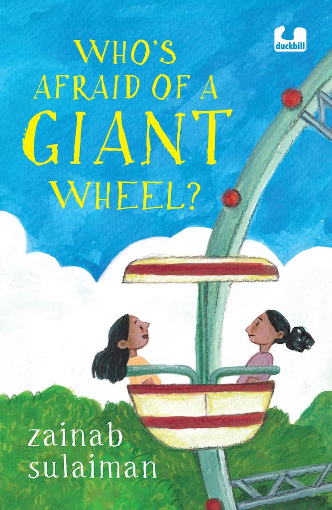 Book cover
Text:
Who's Afraid of a Giant Wheel?
Zainab Sulaiman
Image:
Illustration of two girls on a giant wheel, against a blue sky with a white cloud.